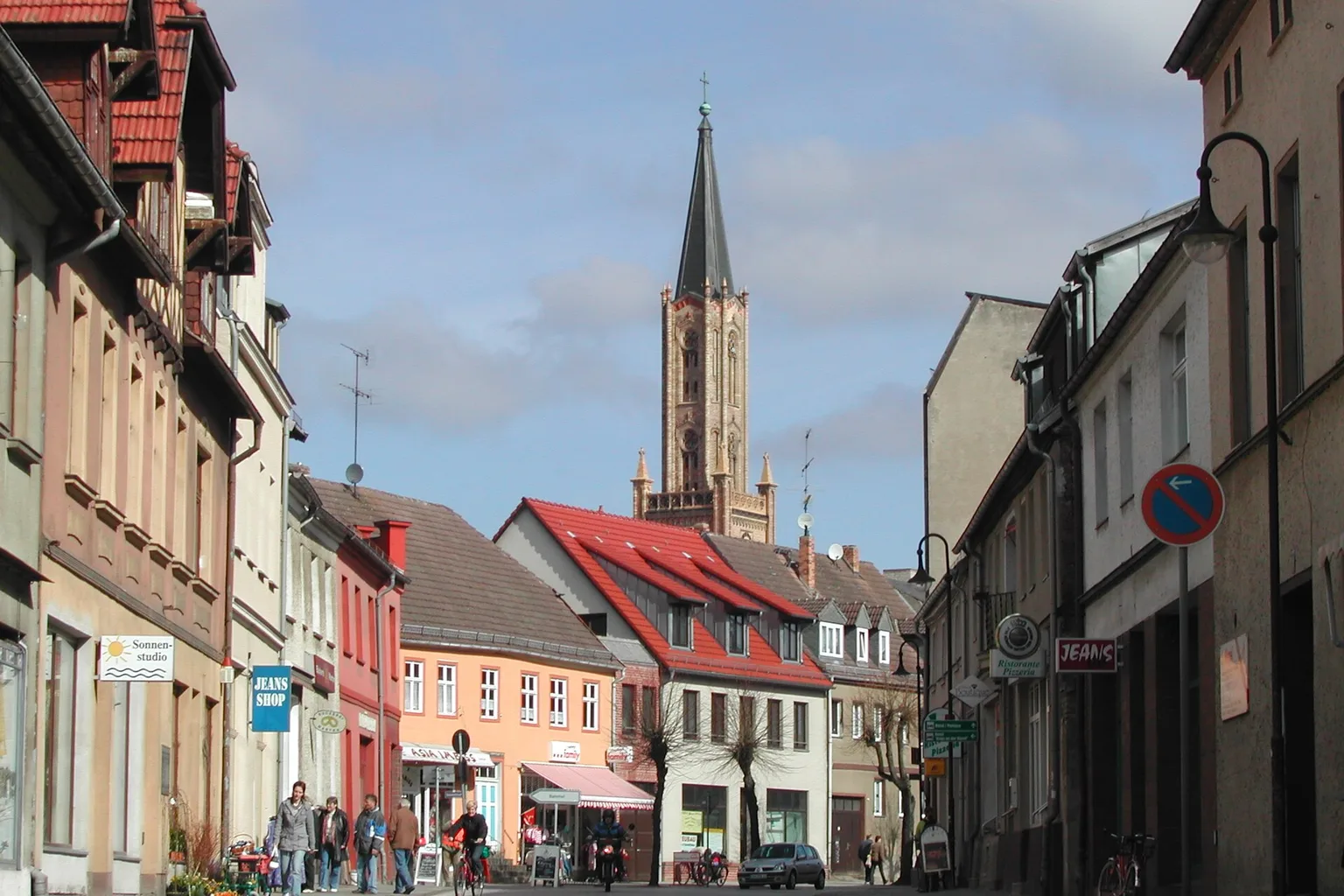 This picture shows the steeple in Fürstenberg/Havel, Germany. The street in front is called Brandenburger Straße.